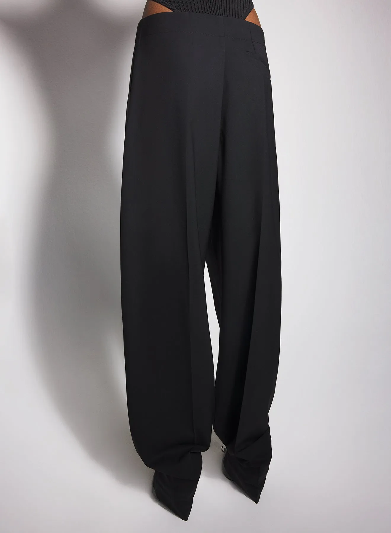 black pierced loose tailored trousers