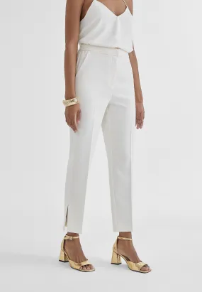 Cropped trousers with slits